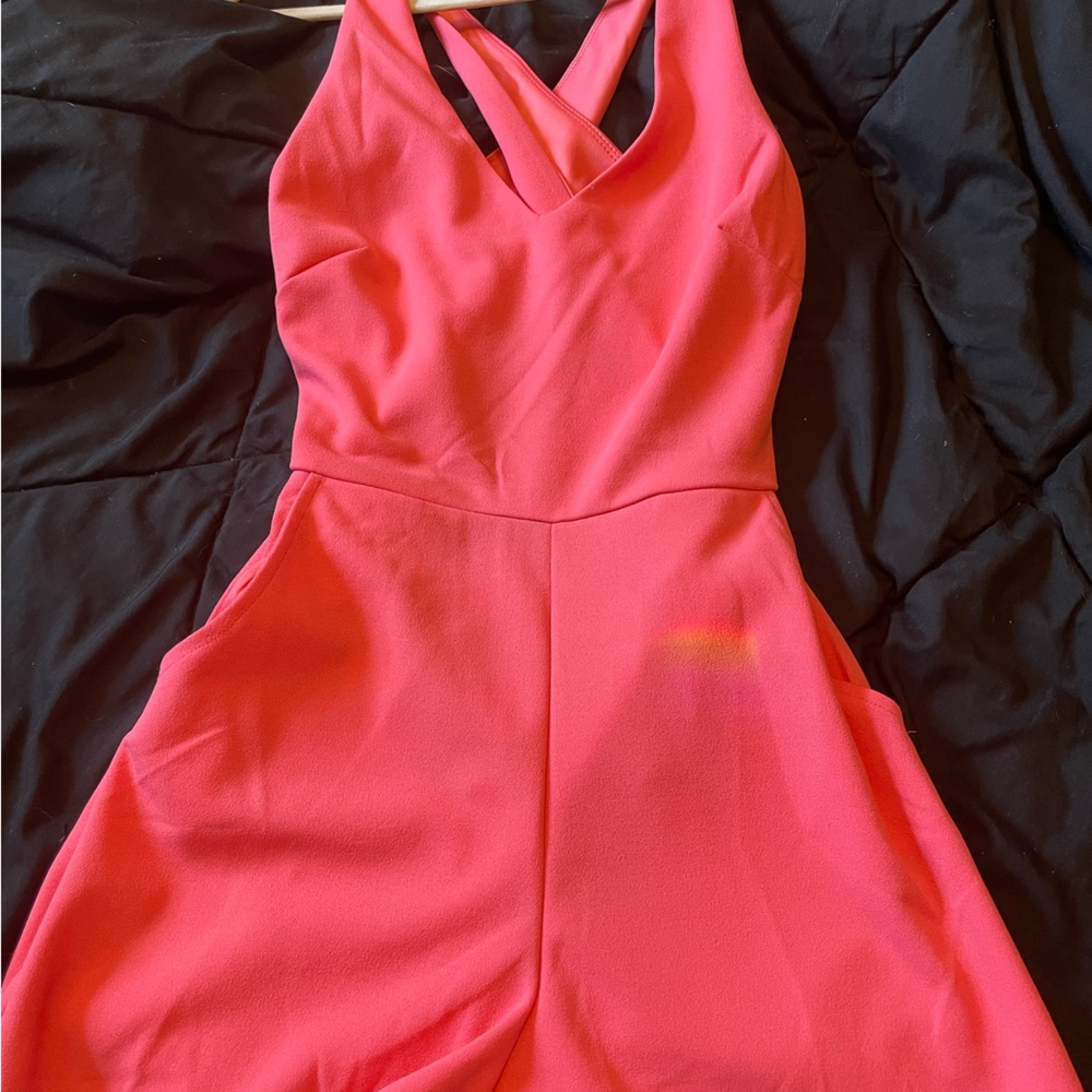 pink romper with pockets